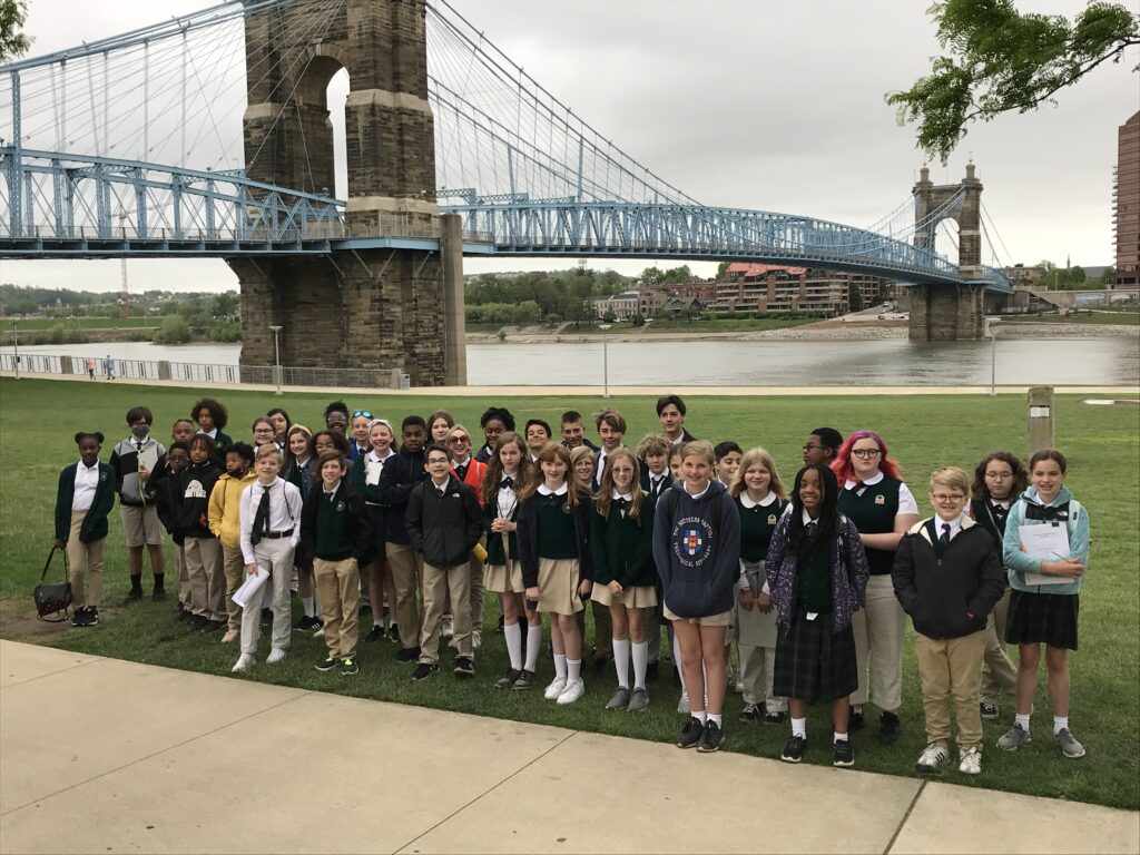 6th Grade Students in Front of a Bridge